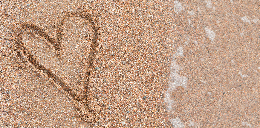 Ritat hjärta i sand